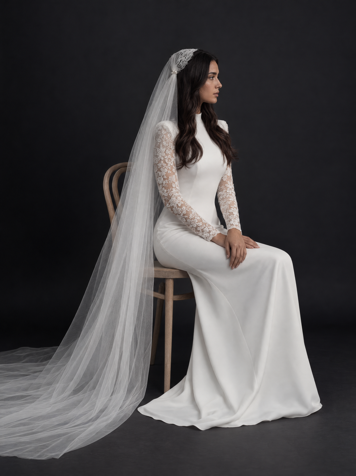 The Juliet veil — bride seated in the cathedral length veil