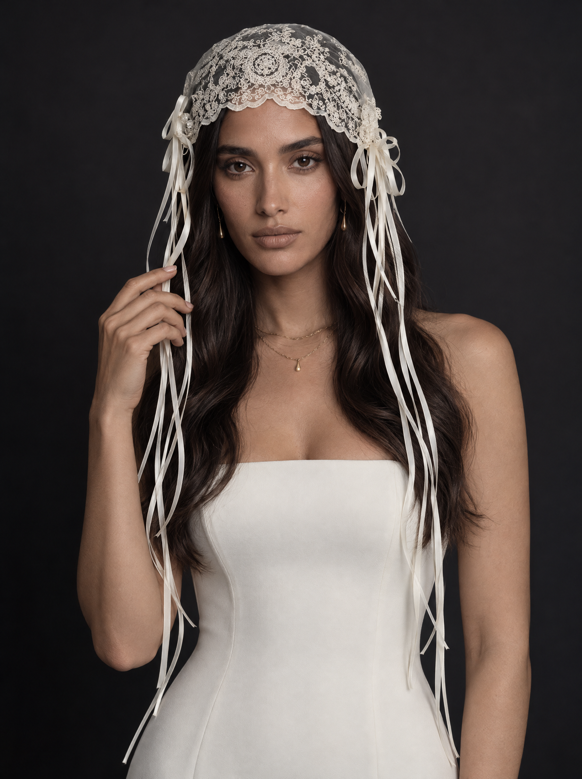 The Amara veil — front view, lace cap with long ribbon streamers