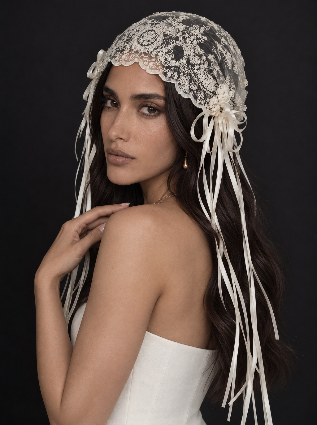 The Amara veil — close-up of the vintage lace cap and ribbon streamers