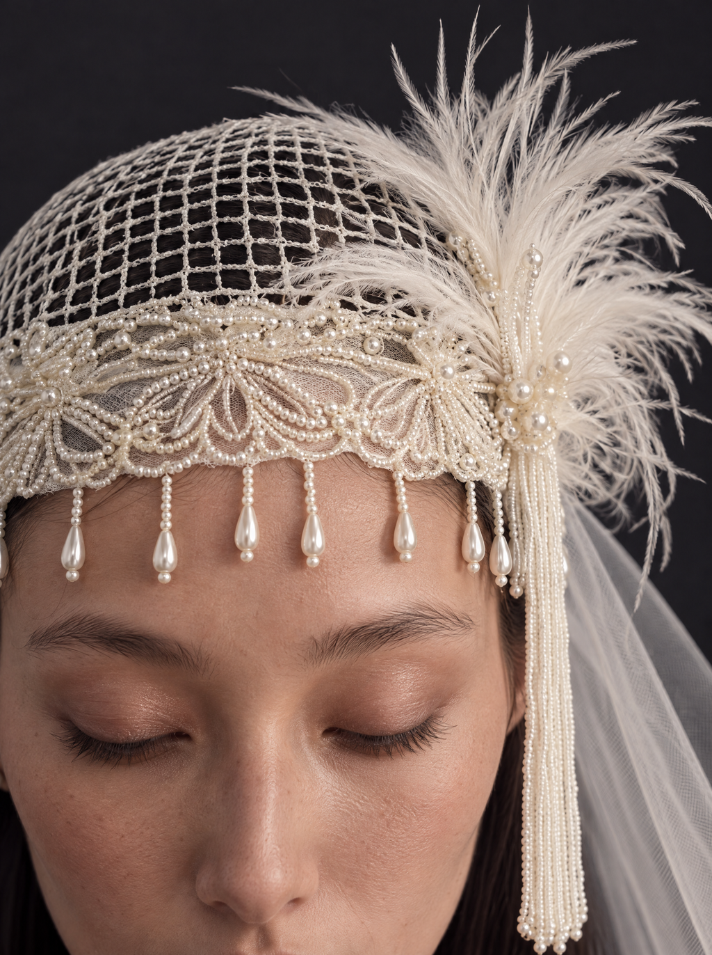 The Isolde veil — detail of the beaded lace cap, pearl drops and feather plume